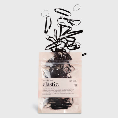KITSCH Black No-Snag Elastics 100pc Set — product shot with elastics spilling out of the pouch — 100 reusable no-snag elastics for ponytails and braids