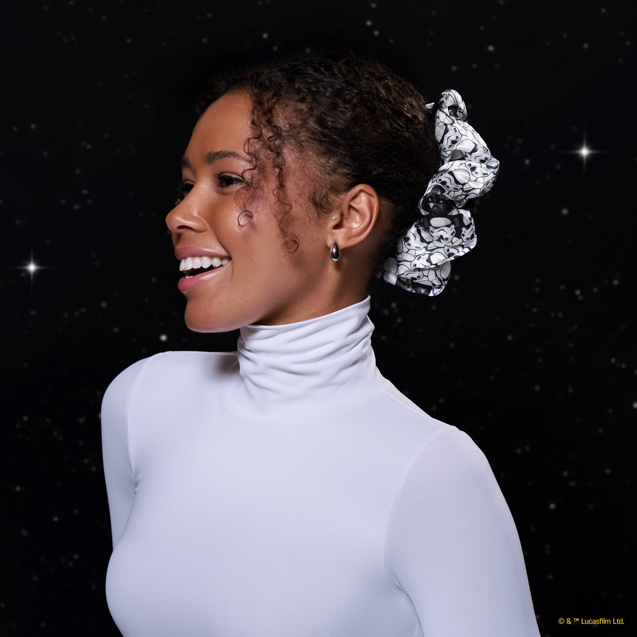 KITSCH Star Wars™ & Kitsch Pillow Scrunchies® in Satin - R2-D2 & Stormtroopers — model wearing Star Wars satin pillow scrunchie — limited-edition collab design, gentle on all hair types