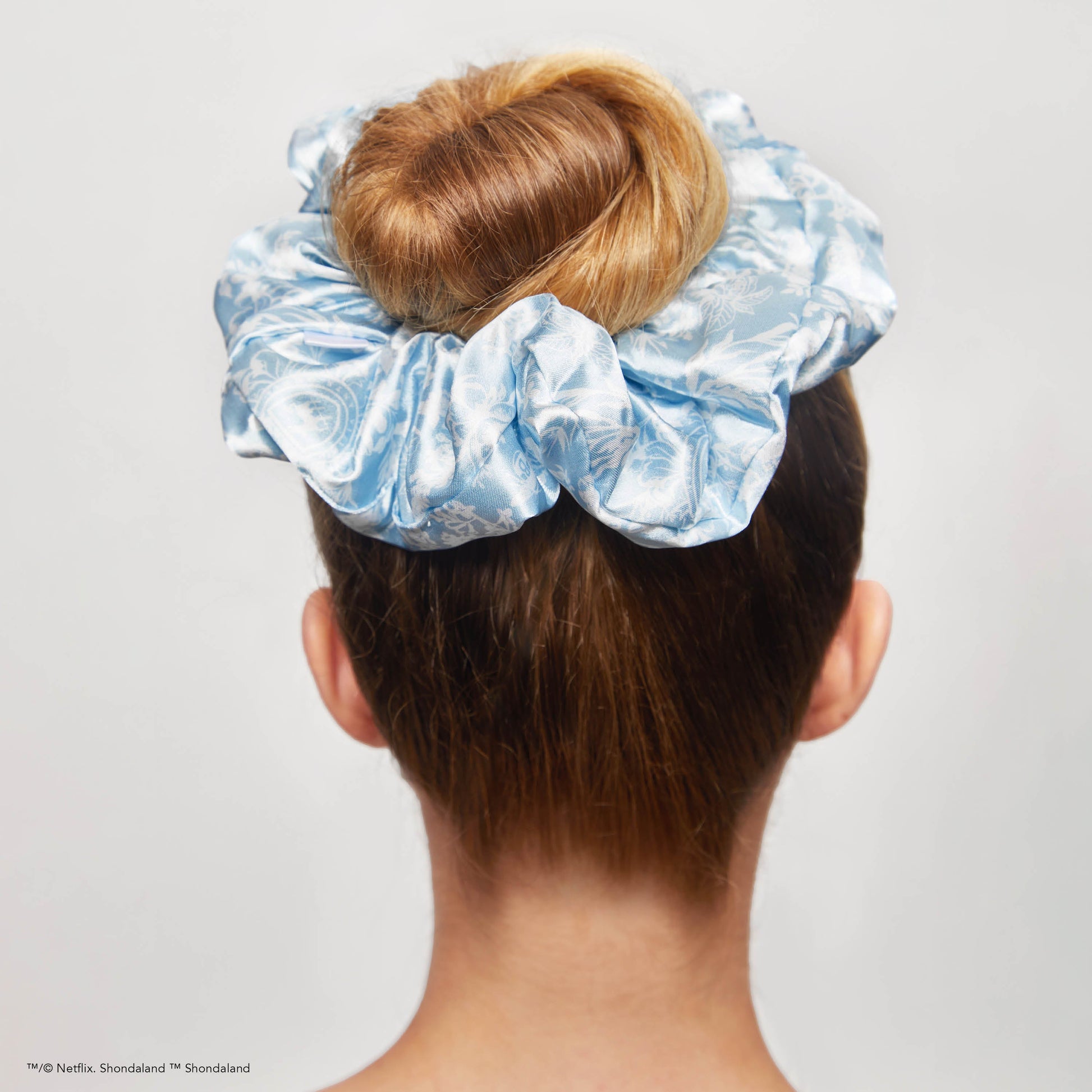 KITSCH Kitsch x Bridgerton Satin Pillow Scrunchies in Toile De Blue — model wearing Toile De Blue pillow scrunchie — silky construction won't crimp or damage hair overnight